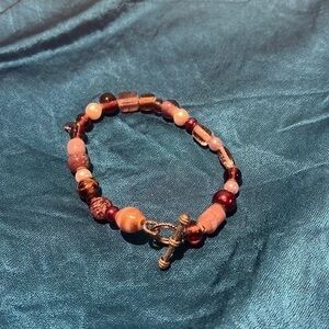 Purple glass bead bracelet with toggle clasp.